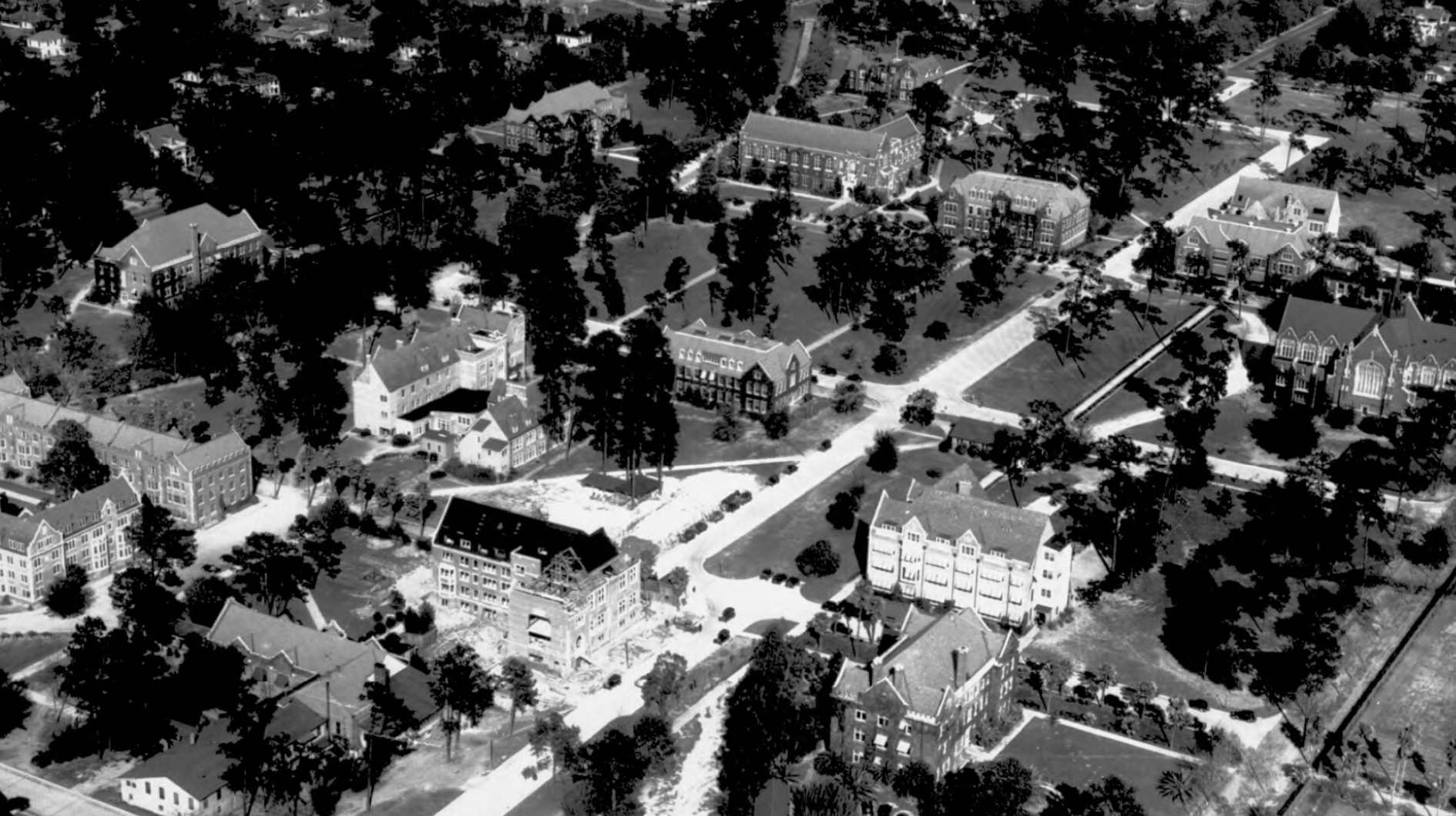 Aerial view of University of Florida campus with building construction in progress, 1930's.