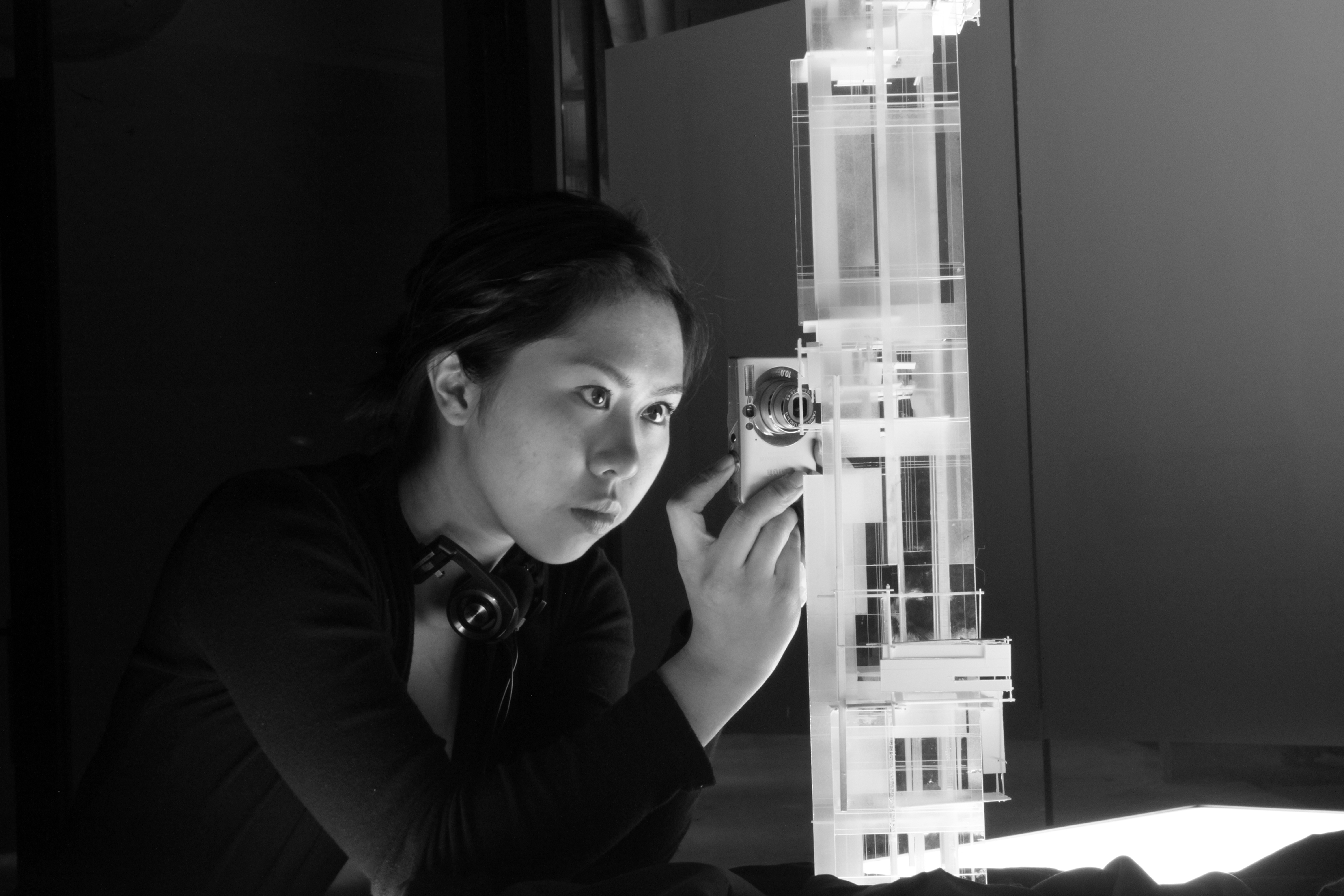 Clarissa Antioquia taking photo of design for tower project by Adam Mahardy