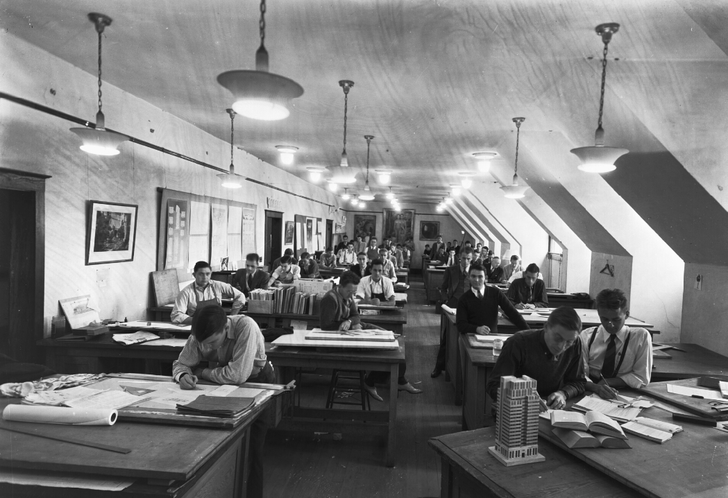 View of drafting room and architecture students working at tables