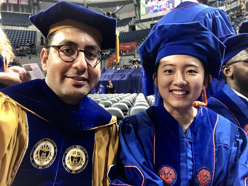 Students and professor at graduation