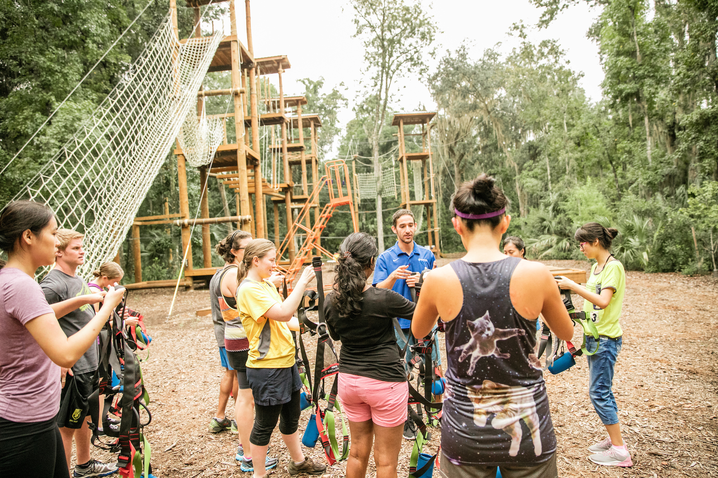 UF students preparing to use a ropes course.