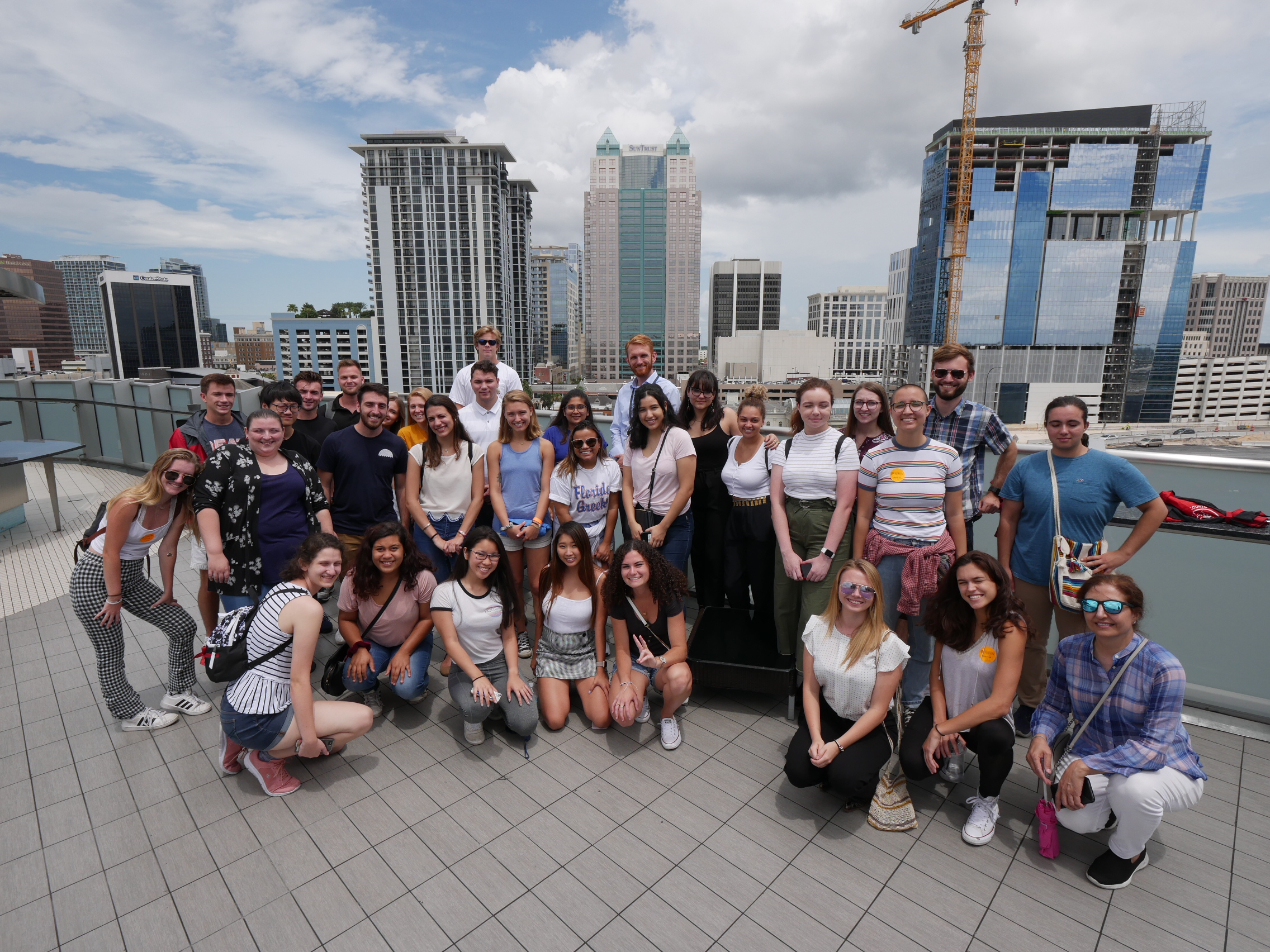 SBE students pose for a group photo on the top of a building in Downtown Orlando, FL.