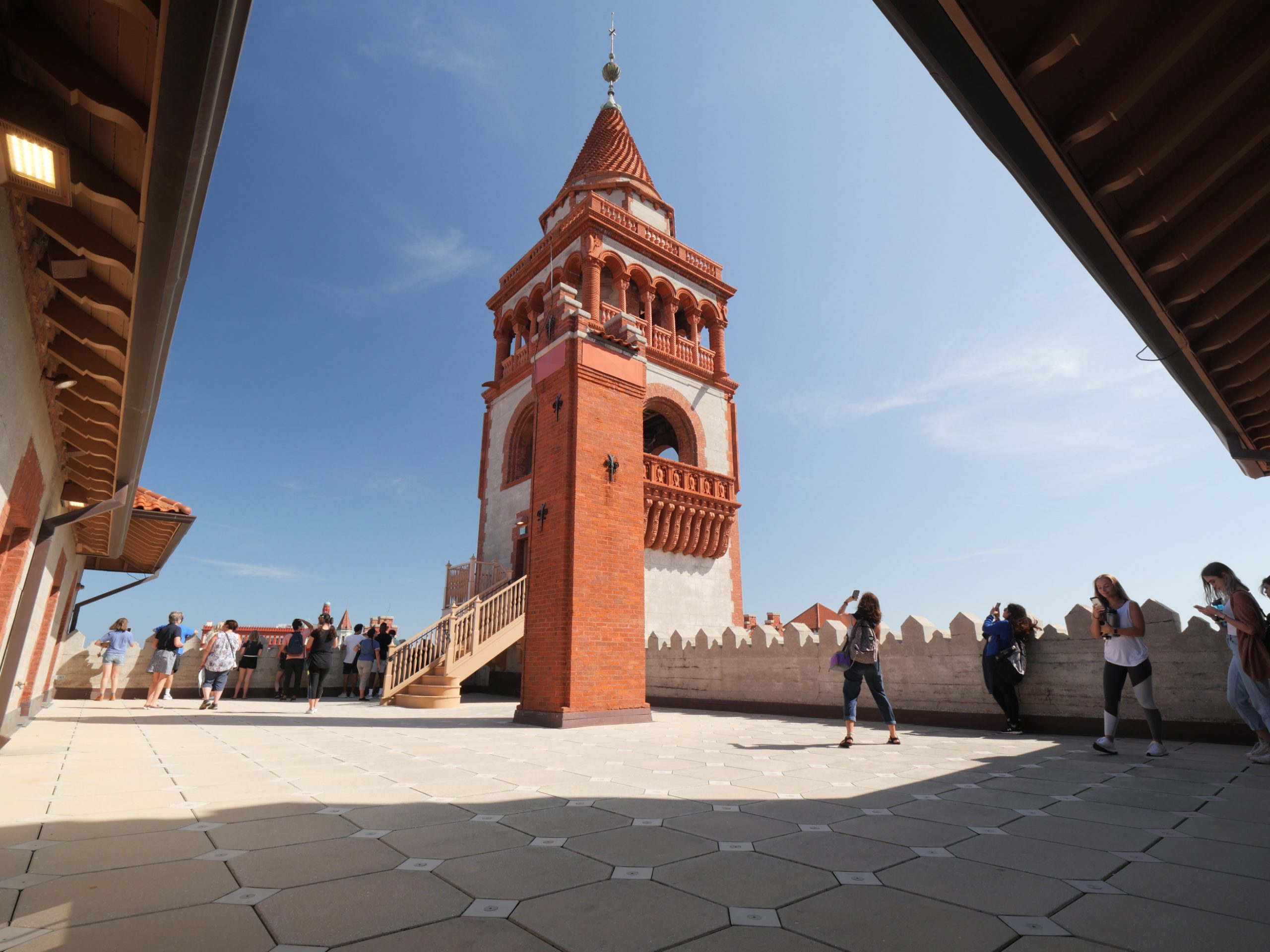 SBE students walking on the roof of a historic building at Flagler College.