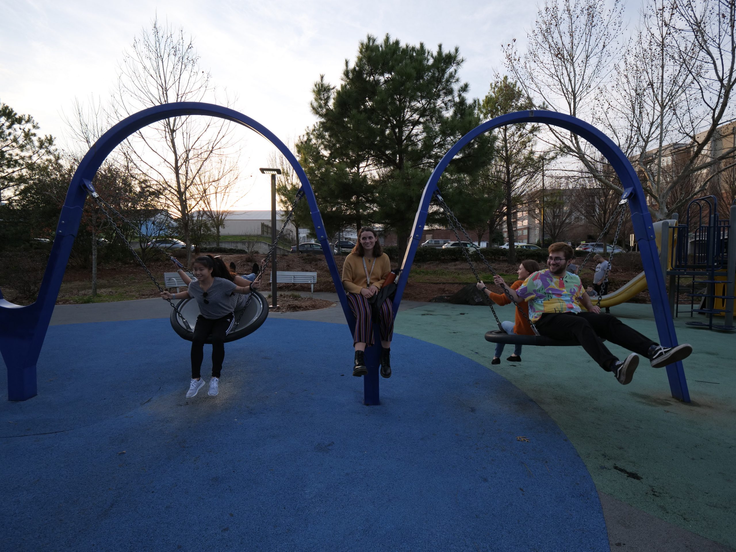 SBE students swing at a playground on the Beltline in Atlanta, GA.