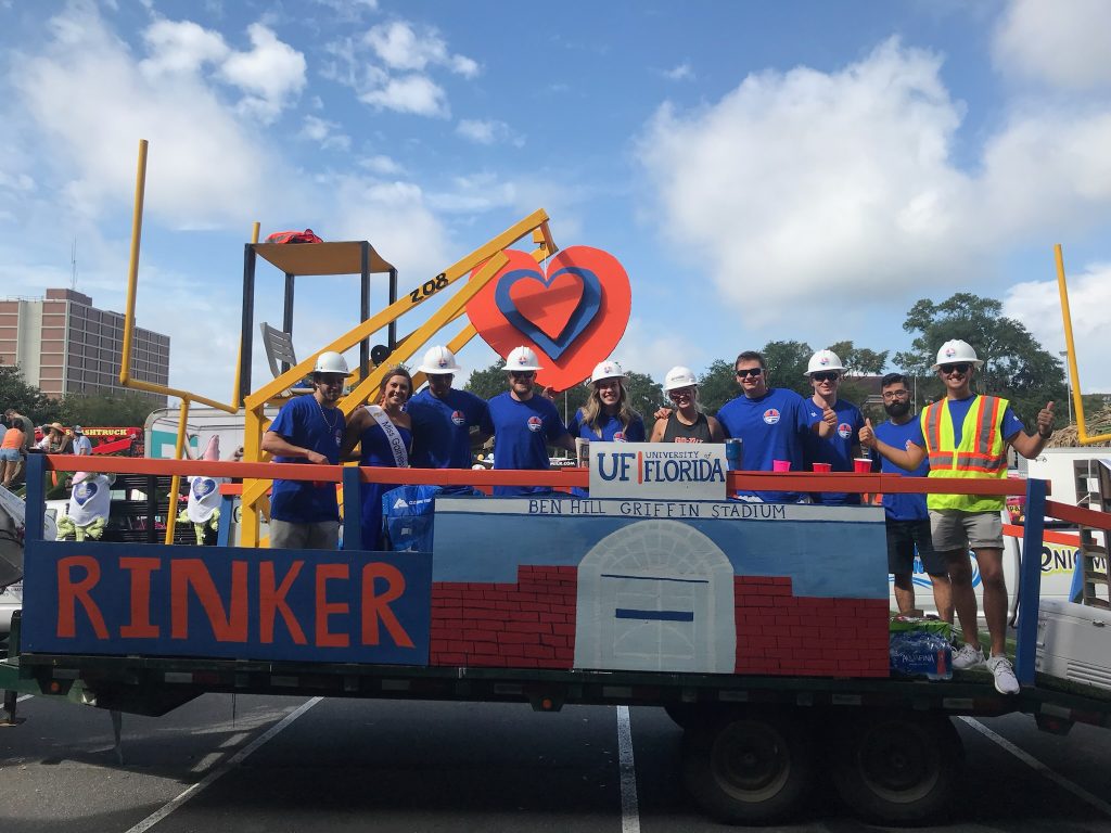 Spring 2022 and Fall 2023 Rinker Graduates on the 2021 Rinker Homecoming Float.